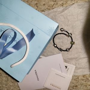 Pandora bracelet has 5 beads bag n papers